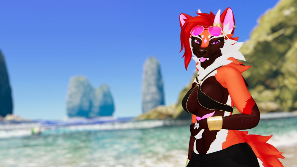 My maned wolf hellhound, Eva, on a beach with waves and a rocky shore behind her. She is wearing lightweight beach attire.