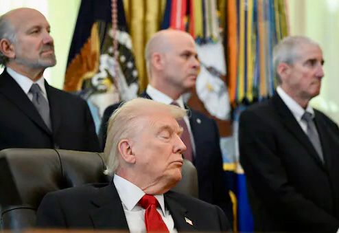 Zoom in for strange red marks on the back of Trump’s neck.