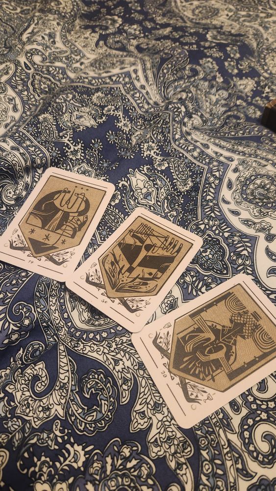 Oracle cards (divination) on a bedspread. 14: mending/reformation/alteration
30: innocence/summer/patience
20: preciousness/auspicious/creation