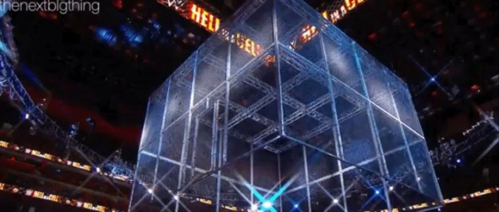 a large cube in a stadium with the word hell on it