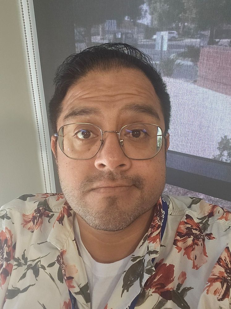 Just a selfie of me, wearing my floral shirt.