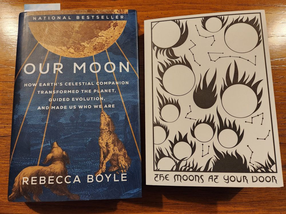 A picture of two books. One is "Our Moon" by Rebecca Boyle. The other is "The Moons at your Door" by David Tibet.