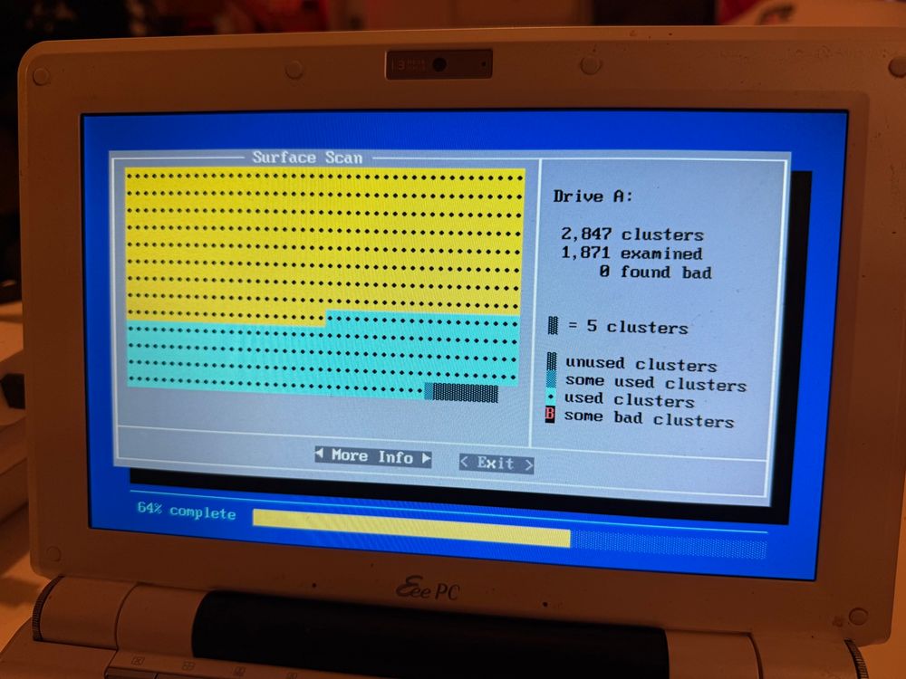 running ScanDisk’s Surface Scan on a floppy disk via the netbook, which shows a neat colourful visualisation of which clusters it’s examined so far