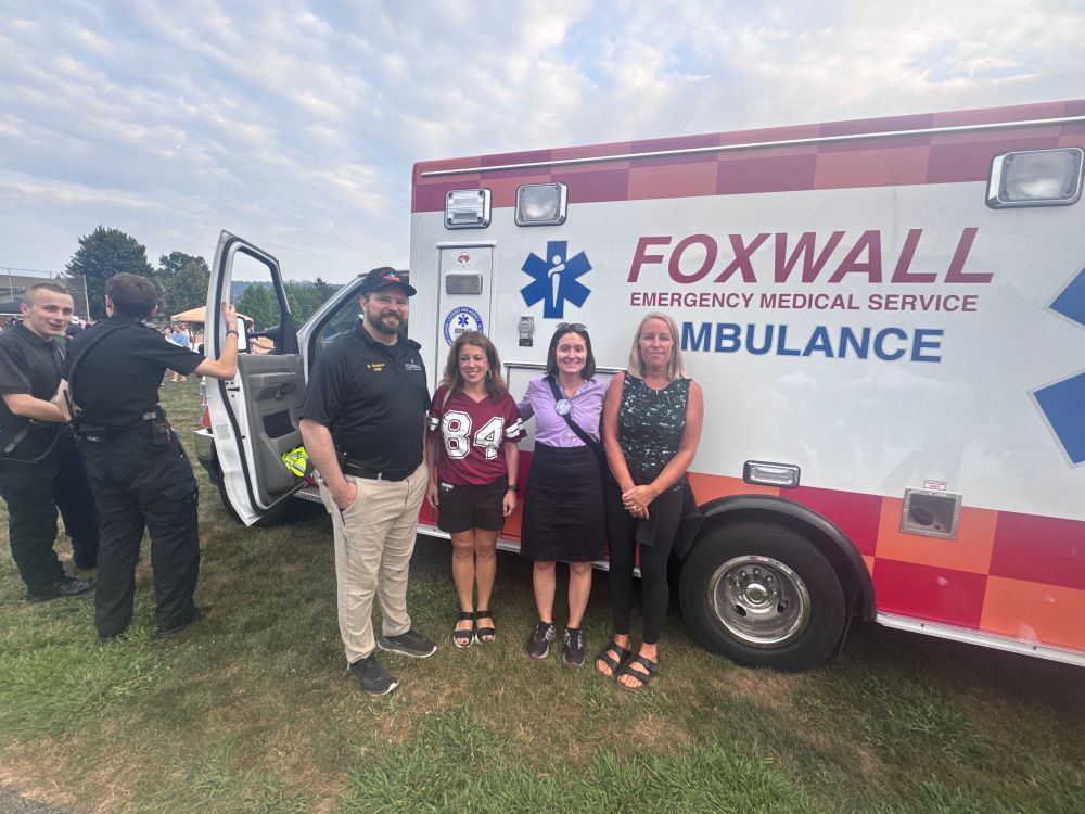 Lissa state Rep. Mandy Steele and Foxwall EMS chief smiling at camera 