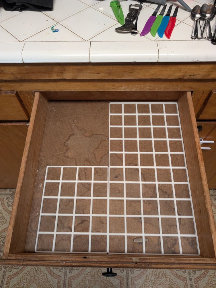 The start of a gridfinity drawer in my kitchen 