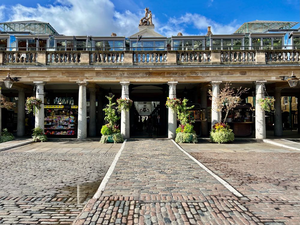 Covent Garden market, London; monolithic Doric columns carrying a horizontal entablature & balustrade; photo mine