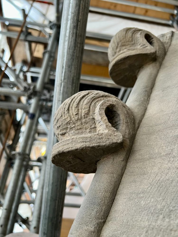 Pinnacle in sandstone with crockets at the angles resembling curling foliage or wood shavings