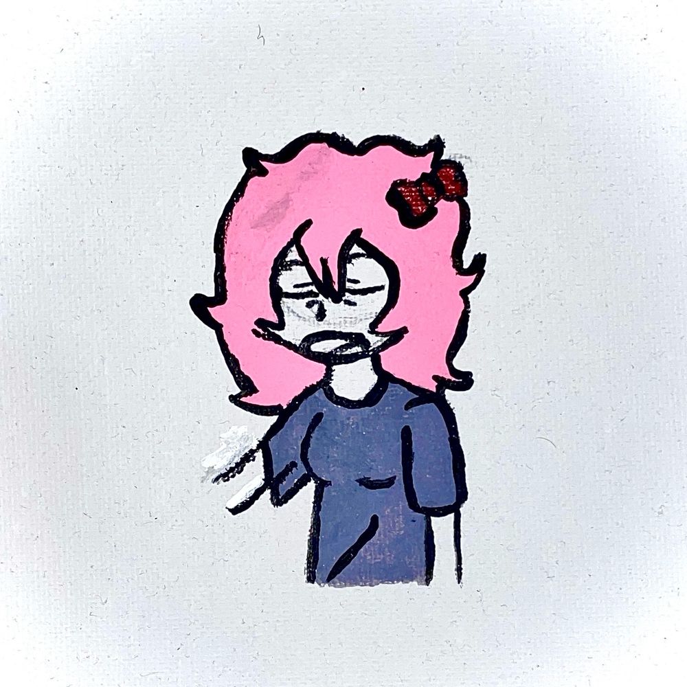 A girl with messy pinky hair and a red bow looks like she is over every thing and every one
