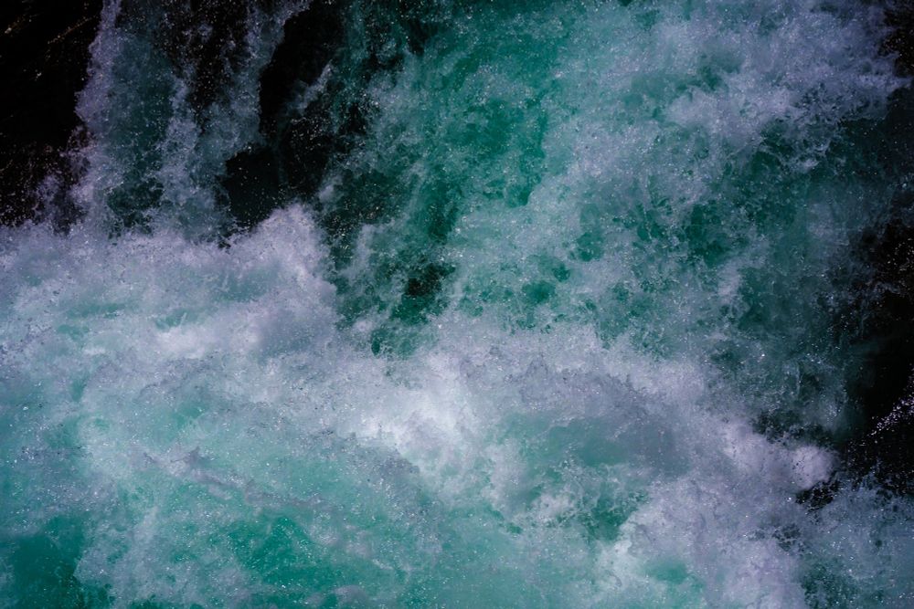 High shutter speed capture of glacial waters of McDonald Creek (that runs along Going-to-the-Sun road.