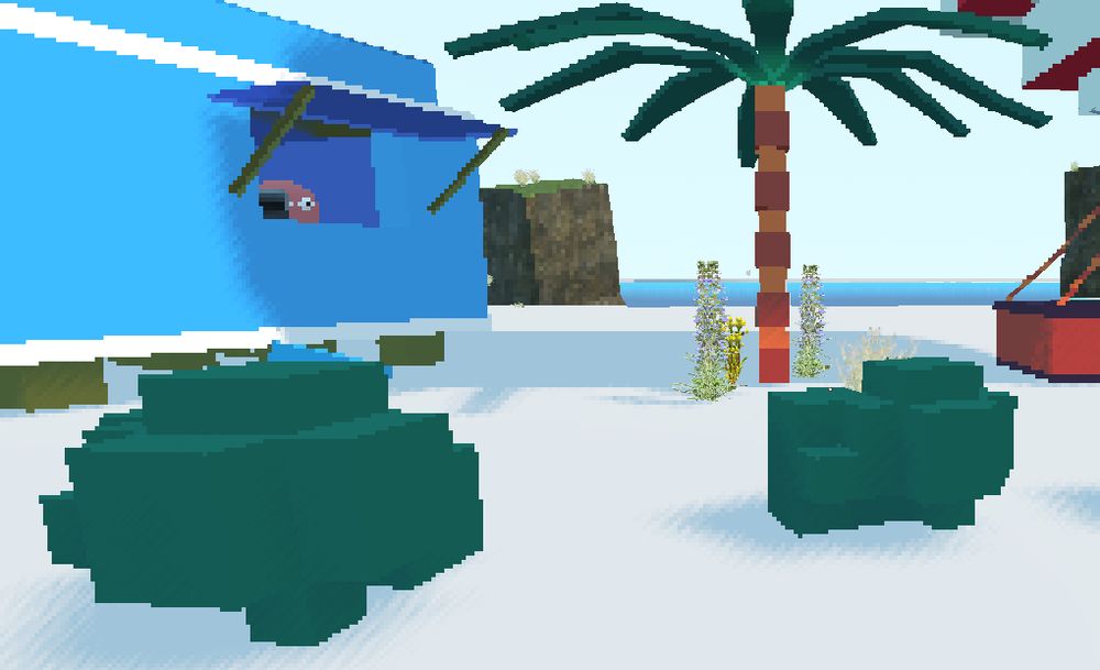bushes and palm tree near blue shop