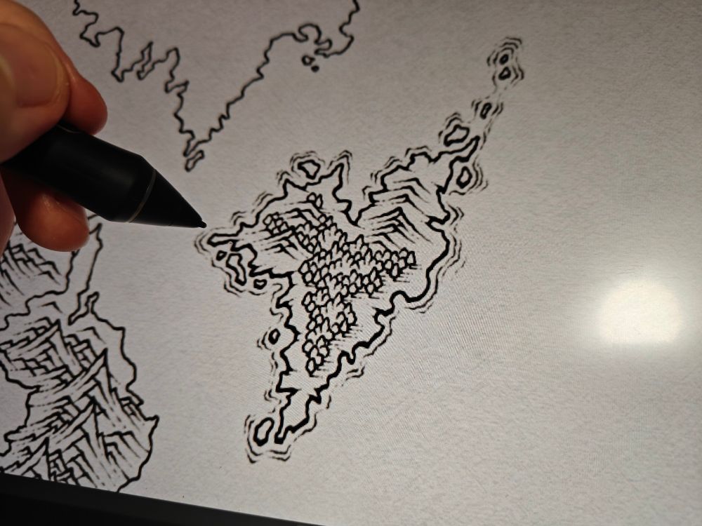 A work in progress black and white map featuring an island with forests and a couple of smaller mountains 