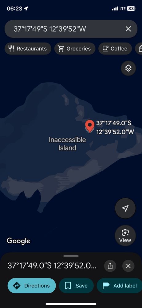 The coordinates in the post located on “Inaccessible Island”, an island in the South Atlantic Ocean