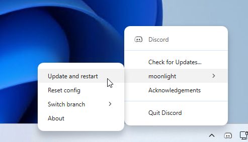 Screenshot of the "Update and restart" option on Discord's system tray entry