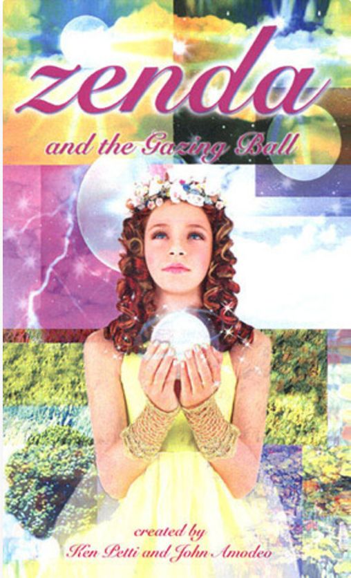The cover of a book titled "Zenda and the Gazing Ball" by Ken Petti and John Amodeo. The cover shows a girl holding a crystal ball in front of a multicolored background.