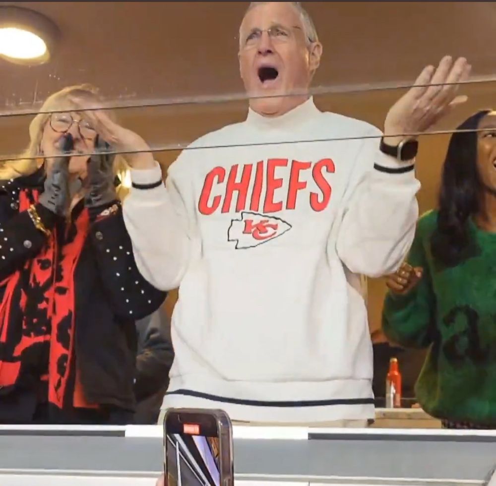 Scott swift with his hands in the air like he’s got questions 