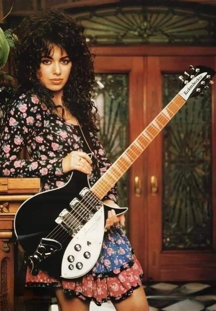 Susanna Hoffs and a Rickenbacker guitar