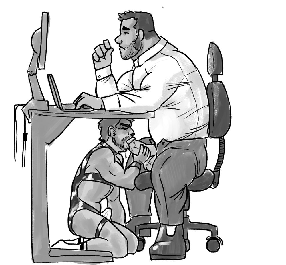 At an office desk, a huge burly man types away, looking slightly bored. Underneath the desk, a smaller man, nude except for a kinky body strap, passionately sucks the man's huge dick. He can barely fit his mouth around the office worker's big shaft, and his own erection is visible straining against his clothes. 