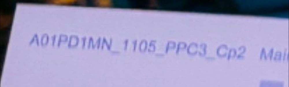 Blurry text at the top left of the printing plate:
A01PD1MN_1105_PPC3_Cp2