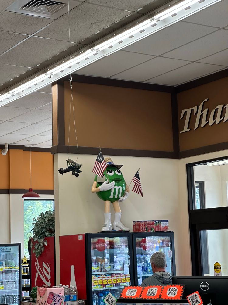 Sexy green m&m with United States flag in a grocery store