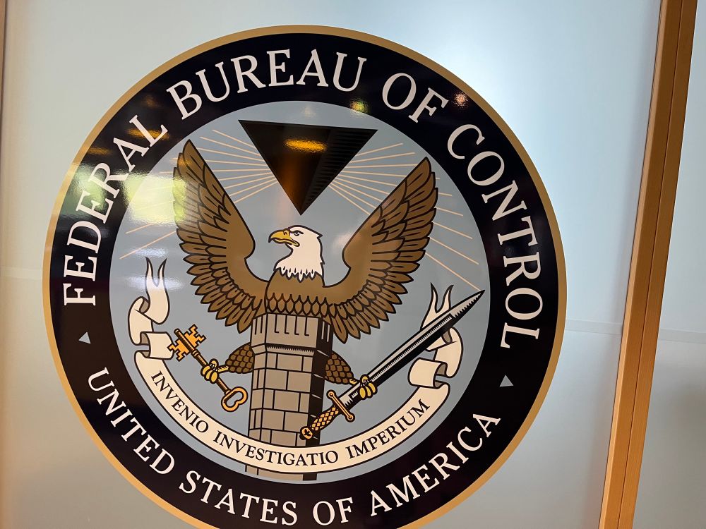 REDACTED (Federal Bureau of Control seal)