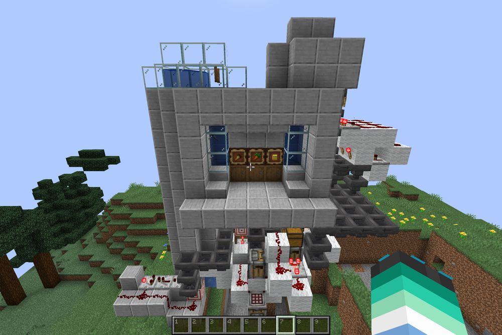 the same design but with water columns and smooth stone and a bunch more redstone and an ungodly amount of hoppers