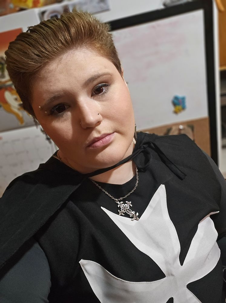 a chest-up selfie of a person cosplaying Mizrak  from Castlevania: Nocturne in a kitchen