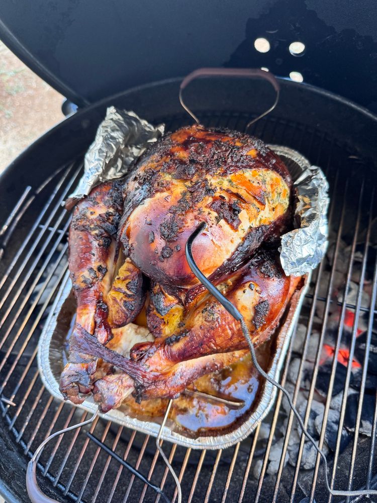 The turkey is still on the grill in the pan as last time, but it’s much more brown all over