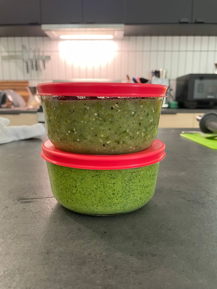 Two Pyrex containers full of green slop 