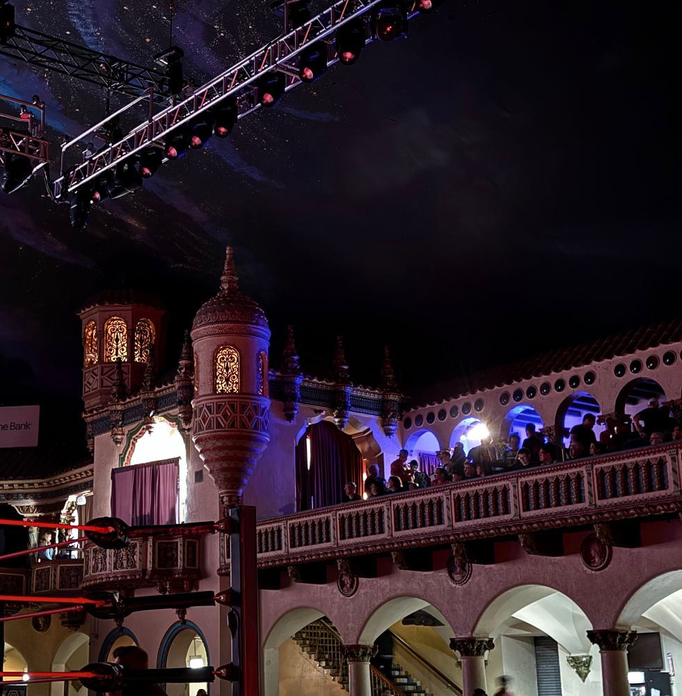 The same fairy castle spires from the first picture, but zoomed out to show a larger portion of the adjacent balcony.