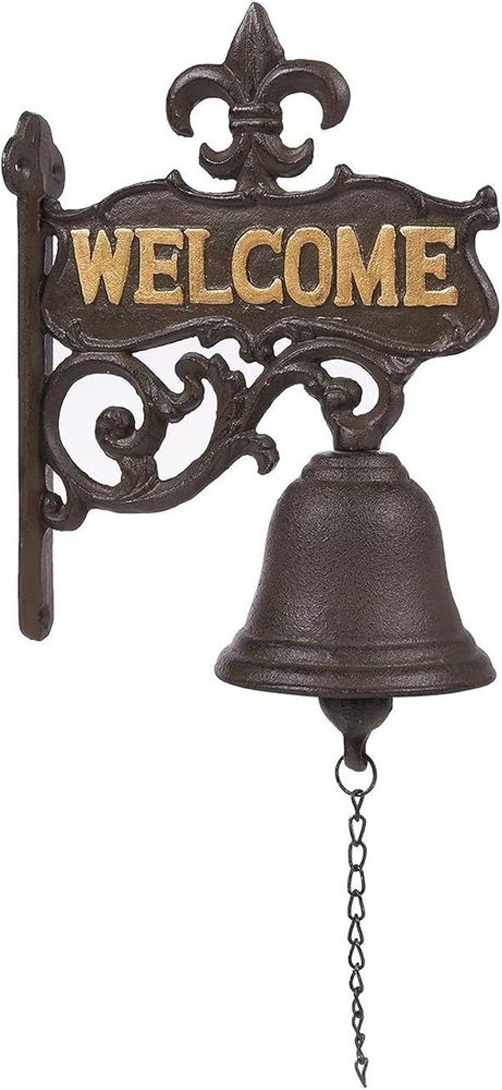 mechanical door bell with Welcome above the bell.