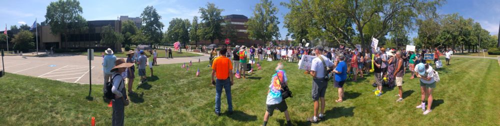 Panoramic photo of hundreds of peaceful protesters at Burlington MA ICE facility