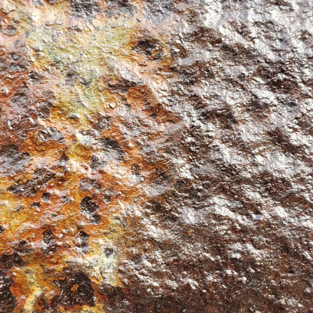 Close up of weathered metal on gate