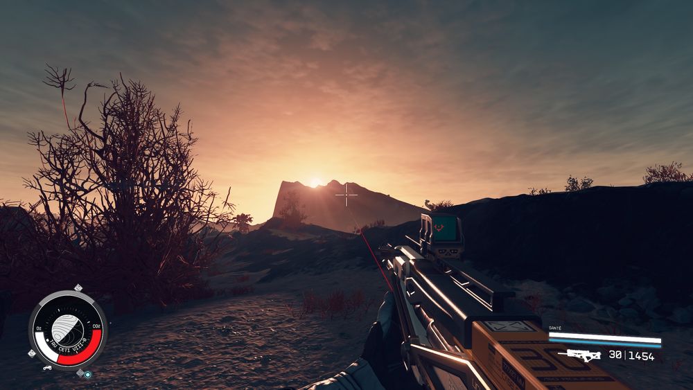 First person with some the game Starfield.

The player is holding their weapon toward a mountain with the sun rising behind said mountain, giving a very mysterious look to the picture.