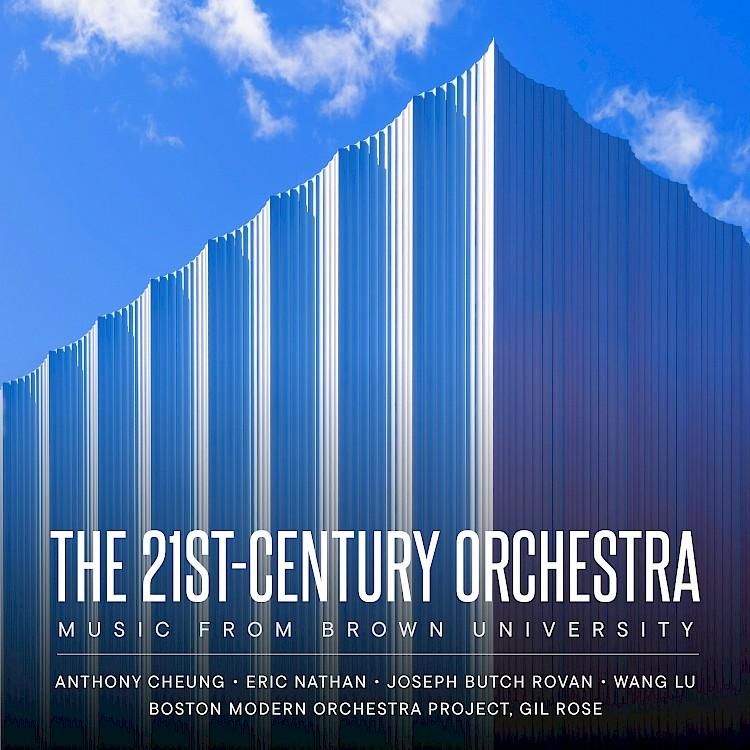 Cover of Boston Modern Orchestra Project's New Focus Recordings album "The 21st-Century Orchestra: Music from Brown University", featuring a massive forbidding structure with no entry points with a blue sky and scattered clouds above.