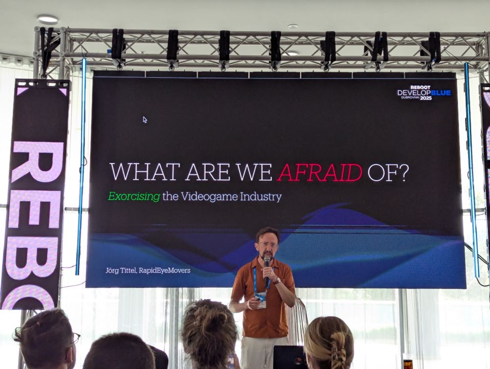 Jörg Tittel speaking at Reboot Develop Blue 2025.