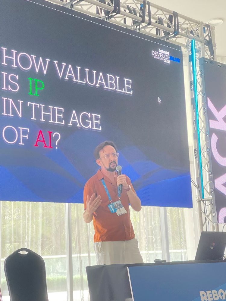 Jörg Tittel speaking at Reboot Develop Blue 2025.