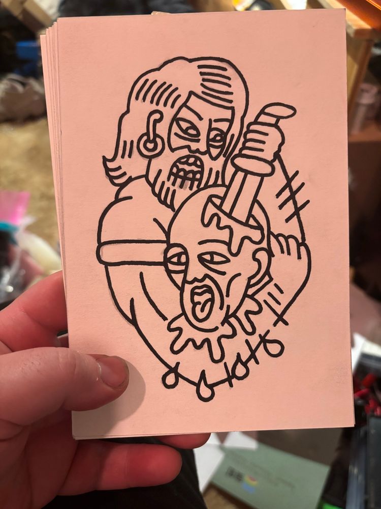 tattoo drawing of a man stabbing another man in the head