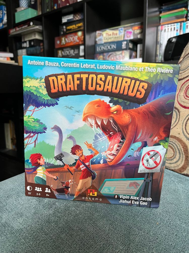 Box cover for Draftosaurus board game.