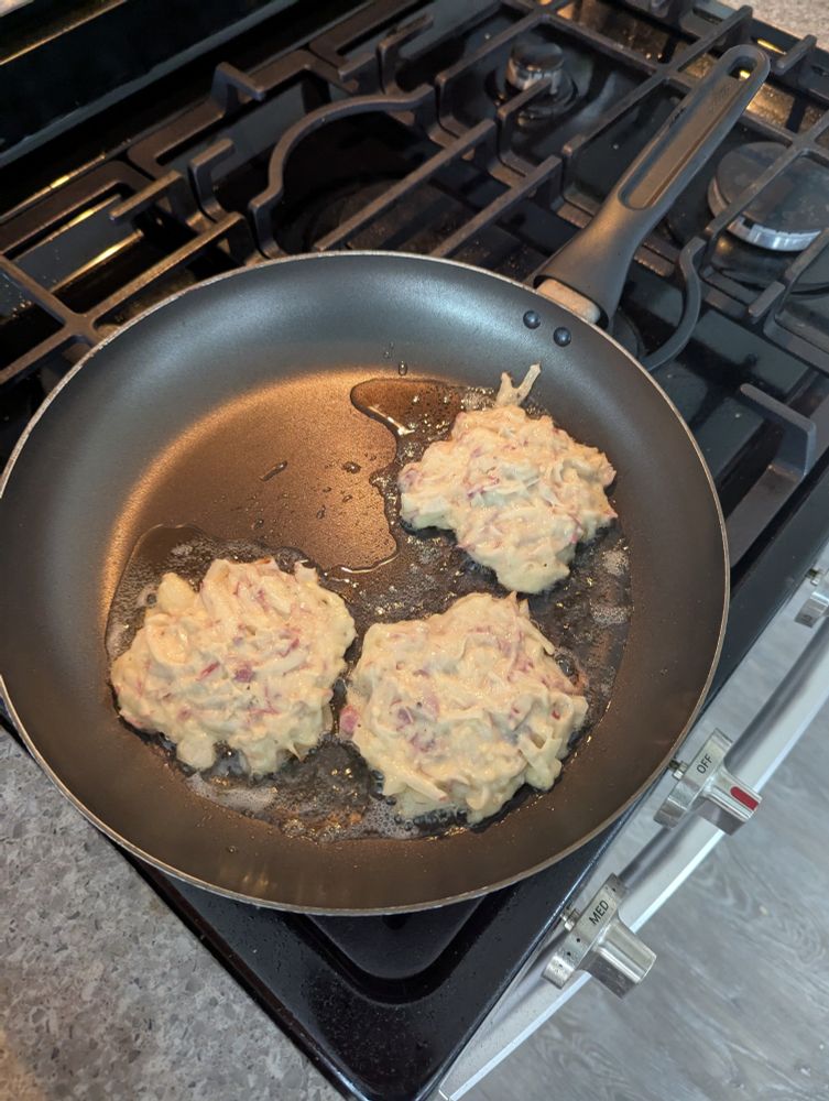 Boxty Cakes patties frying on the stove. Some day, when I'm rich (I did buy a Powerball ticket for tonight), I'm going to tear out the gas and replace it with an induction top. 