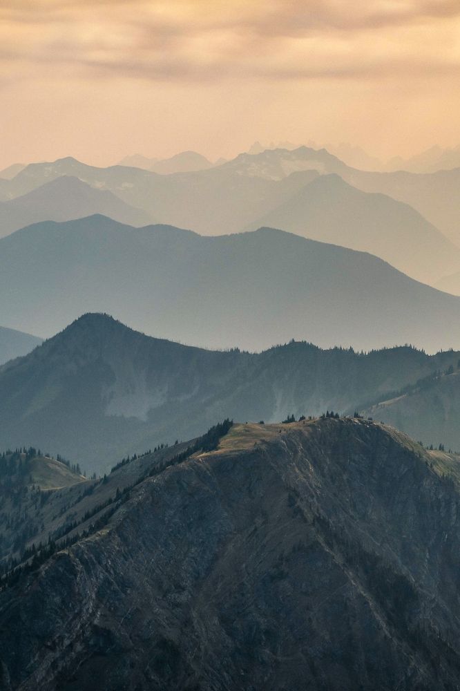 The vast landscape of the Pasayten Wilderness at sunset with undulating ridges captured from Full Moon Rising near the Canadian border.