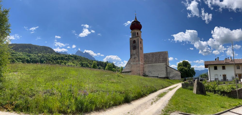 View of the church at Sankt Oswald near Kastelruth with mountains scenery