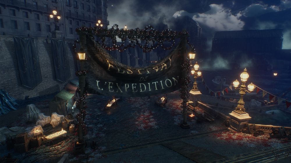 A dock under the night sky, lit up by street lamps. A banner hand half fallen from the entrance. 