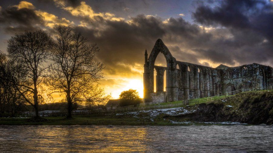 'A winter sunset over Bolton Priory to mark the winter solstice' The priory church and ruins of the Augustinian priory lie at the heart of the Bolton Abbey estate on land gifted to the Augustinian canons by Alice de Rumilly in 1154. 