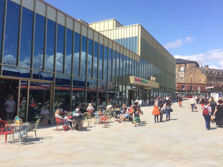 The Lightbox is a key part of Barnsley’s Glass Works regeneration. This four-storey library and community hub features a glass façade overlooking a new public square and offers library services, flexible spaces, and digital learning areas.