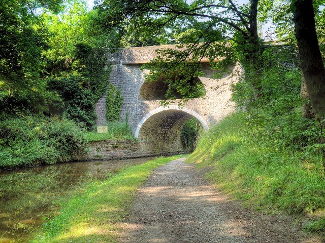 The East Marton double arched bridge by Robert Whitworth dates to around 1790 and now carries the A59 over the Leeds and Liverpool Canal.