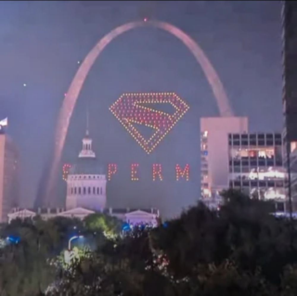 A drone display for super man 2. 

Part of the word superman has been obscured by a building and now simply reads "sperm"