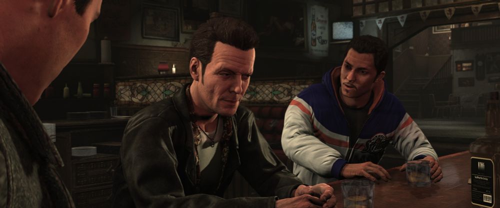 Screenshot from Max Payne 3 with Max's model replaced with one that resembles Sam Lake. Max is sitting at a bar while two men speak to him