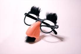Groucho glasses make a convincing disguise.