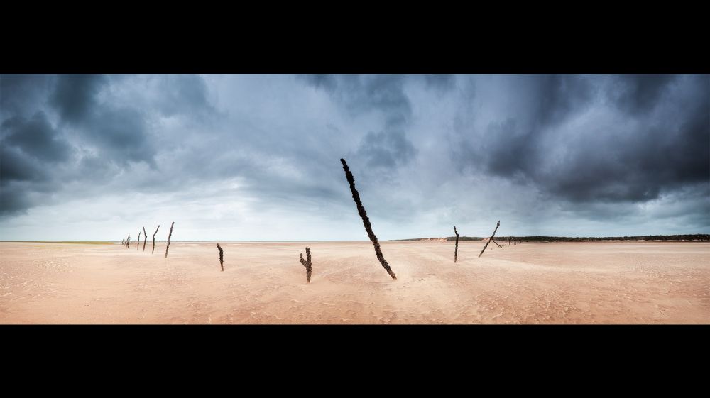 Strong winds sweep across a vast beach as an incoming storm makes landfall over the Bazaruto Archipelago near Mozambique. 