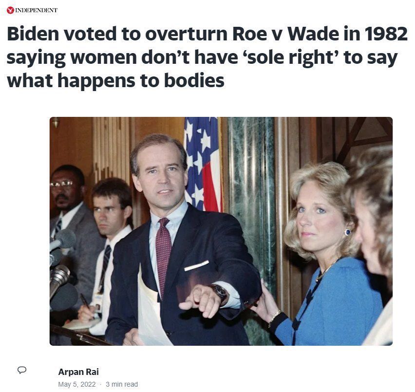 Photograph of an article titled "Biden voted to overturn Roe v Wade in 1982 saying women don't have 'sole right' to say what happens to bodies." The image shows Joe Biden in a suit pointing with his right hand, with Jill Biden standing to his right. Behind him are two men and an American flag.